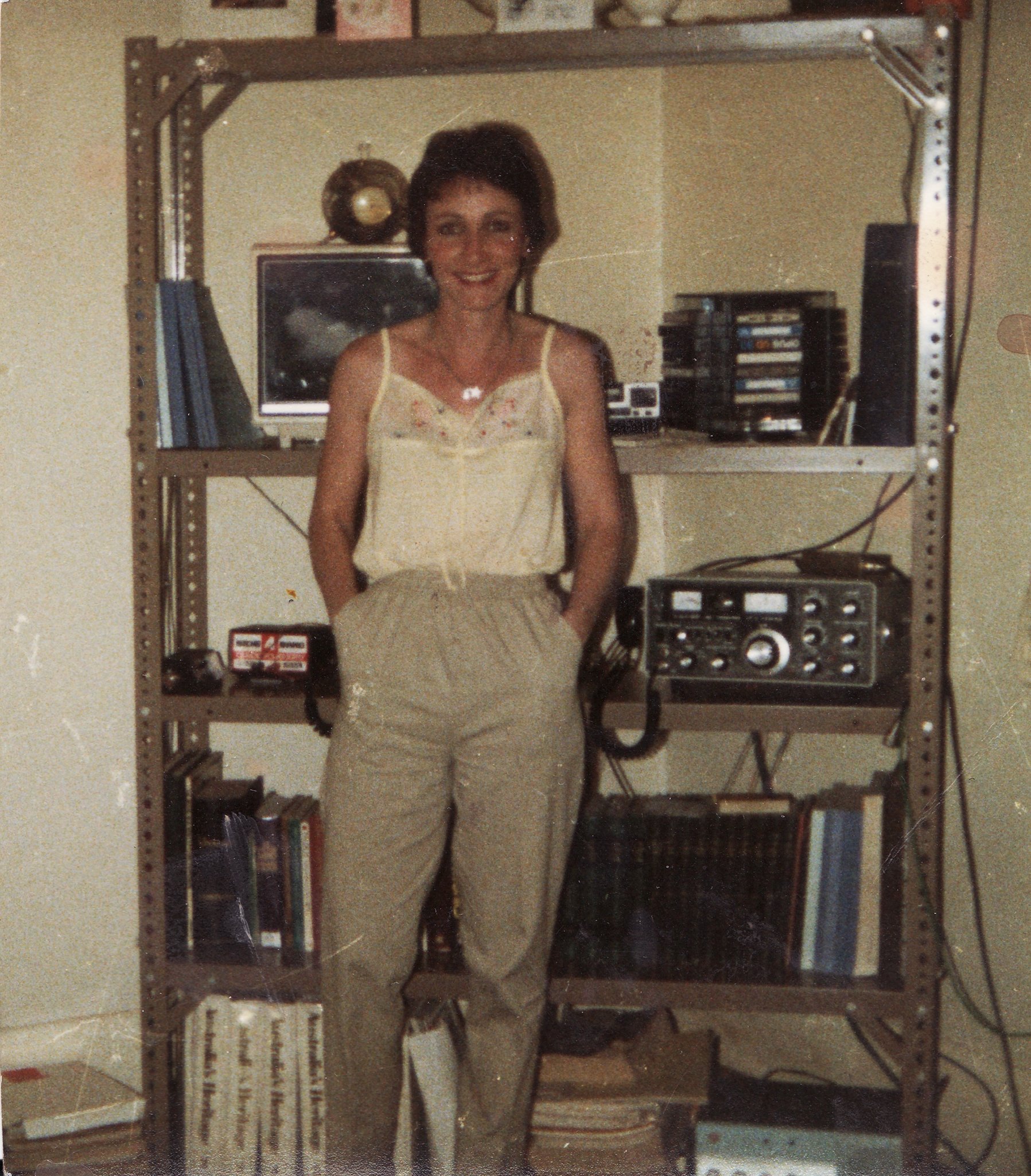 sue standing in front of radios