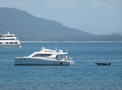 motor catamaran at anchor